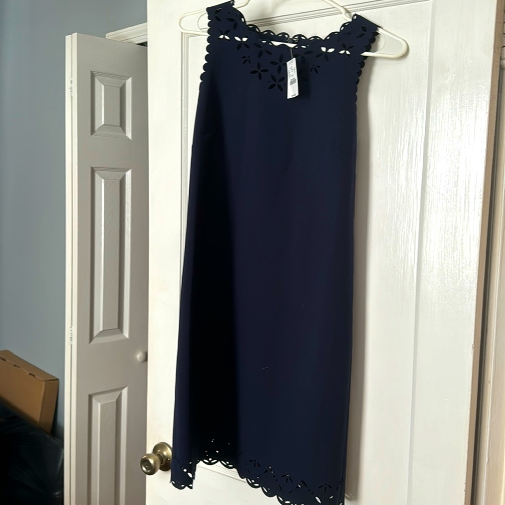 New with tags navy blue j. Crew dress. Eyelet scalloping at top and bottom.